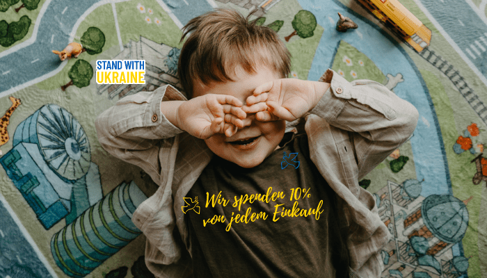 Gemeinsam helfen - HappyCITYKids - finde den perfekten Stadt-Spielteppich für dein Kind