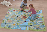 Spielende Kinder auf dem Spielteppich Köln von Happycitykids